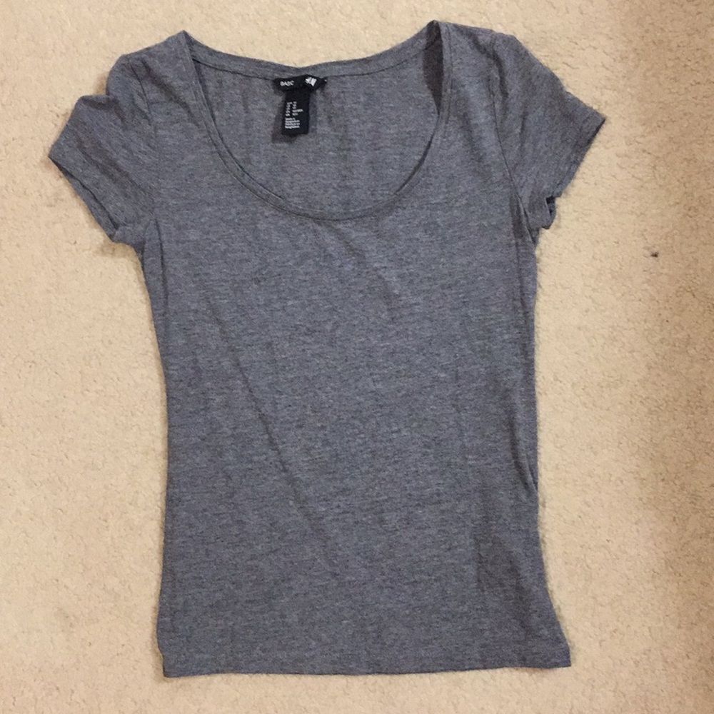 tight fitting gray t-shirt